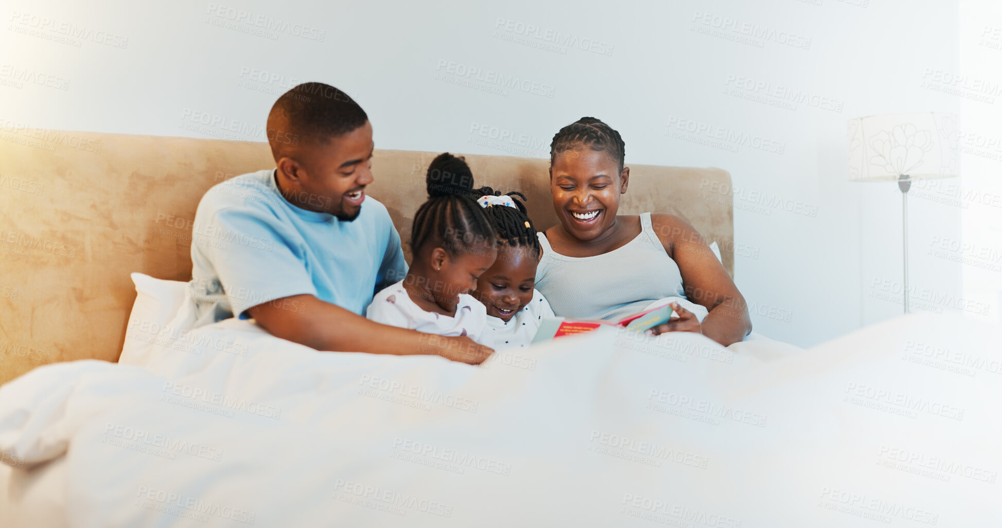 Buy stock photo Black family, kids and reading book in bedroom for storytelling, language development and bonding. Parents, children and fantasy story for education, literacy learning and listening to novel at house