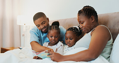Buy stock photo Relax, love and book with black family in bedroom for reading, bonding and learning. Bedtime storytelling, education and fantasy with parents and children at home for fairytale, happiness and care