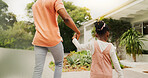 Outdoor, black family and child with holding hands for walking, connection and bonding together. Back, people and father with kid for security, support and relationship on weekend in property