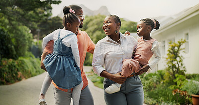 Buy stock photo Outdoor, black family and parents with children for carrying, connection and bonding together by house. Hug, mom and dad with kids for conversation, walking and relationship on weekend in property