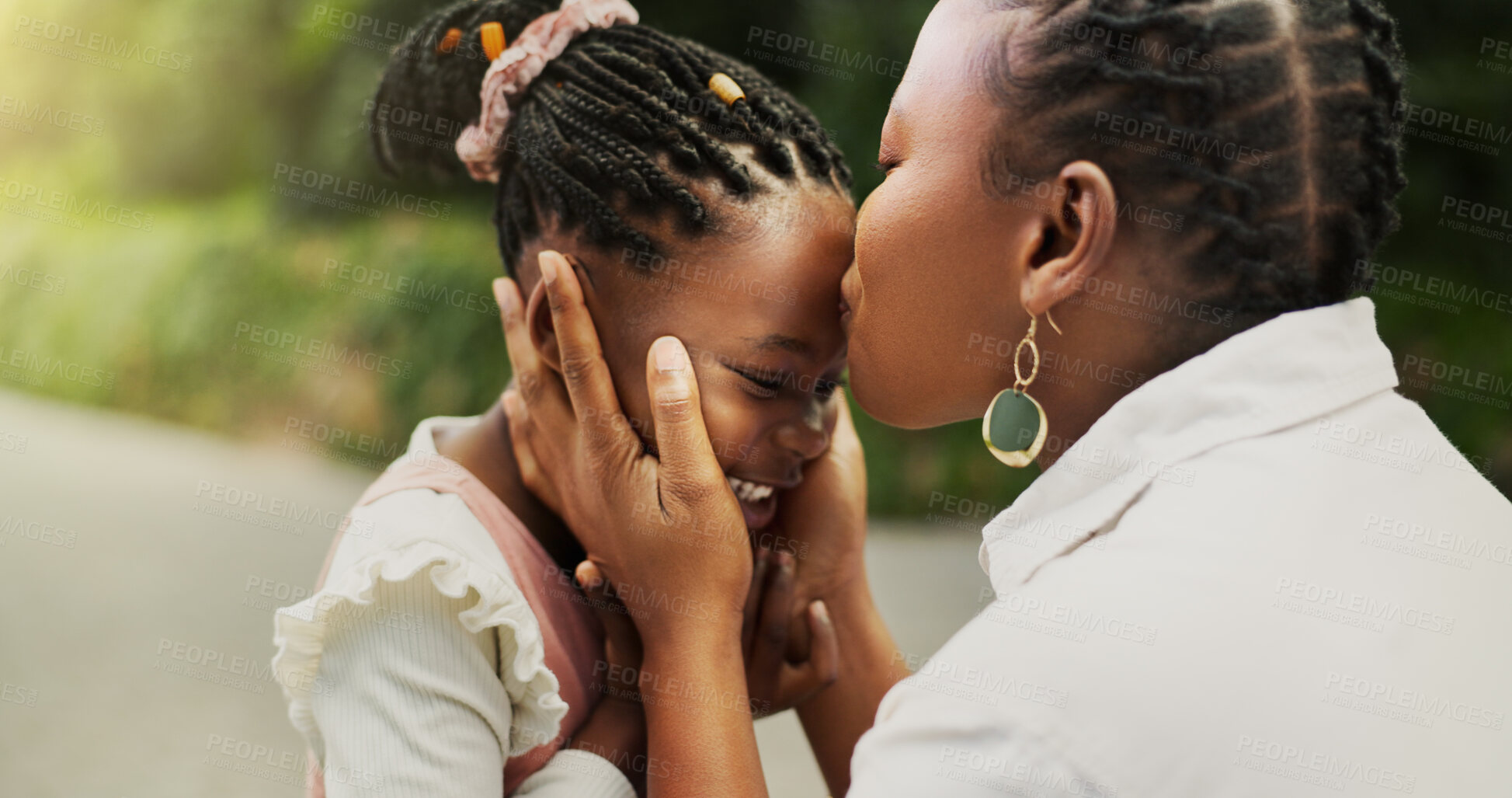 Buy stock photo Kiss, bonding and black mother with daughter in park for support, trust and smile. Embrace, happiness and love with woman and girl on family trip outdoor for peace, comfort and affectionate together