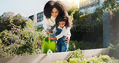 Buy stock photo Gardening, water and mom with child in backyard for planting flowers, learning skills and landscaping. Family, nature and mother with girl together outdoors with plants for growth, hobby and relax