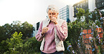 Smell, nature and senior woman with flower in retirement, holiday and vacation in countryside. Peace, outdoor and elderly female person sniffing lavender aroma or scent of plant on field in Australia