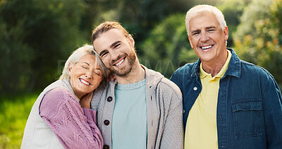 Buy stock photo Portrait, park and senior parents with man for bonding, relationship and relax together. Nature, happy family and elderly father, mother and son embrace outdoors for love, smile and care on weekend