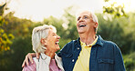 Laugh, happy and old couple in park for support, funny conversation and relax together outdoors in morning. Retirement, nature and senior man and woman embrace for bonding, relationship or romance