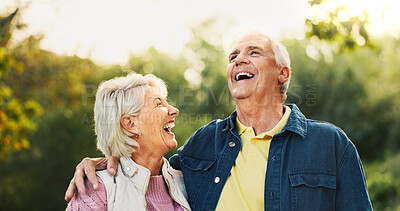 Buy stock photo Laugh, happy and old couple in park for support, funny conversation and relax together outdoors in morning. Retirement, nature and senior man and woman embrace for bonding, relationship or romance
