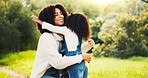 Outdoor, hug and mother with girl, smile and bonding together with relationship, care and joy. Family, parent and mama in park, daughter and embrace with nature, happiness and comfort with love