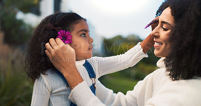 Buy stock photo Flowers, love or smile with mother and daughter outdoor in nature for bonding, safety or trust. Family, happy or relationship with girl child and single parent woman in garden for earth day or spring