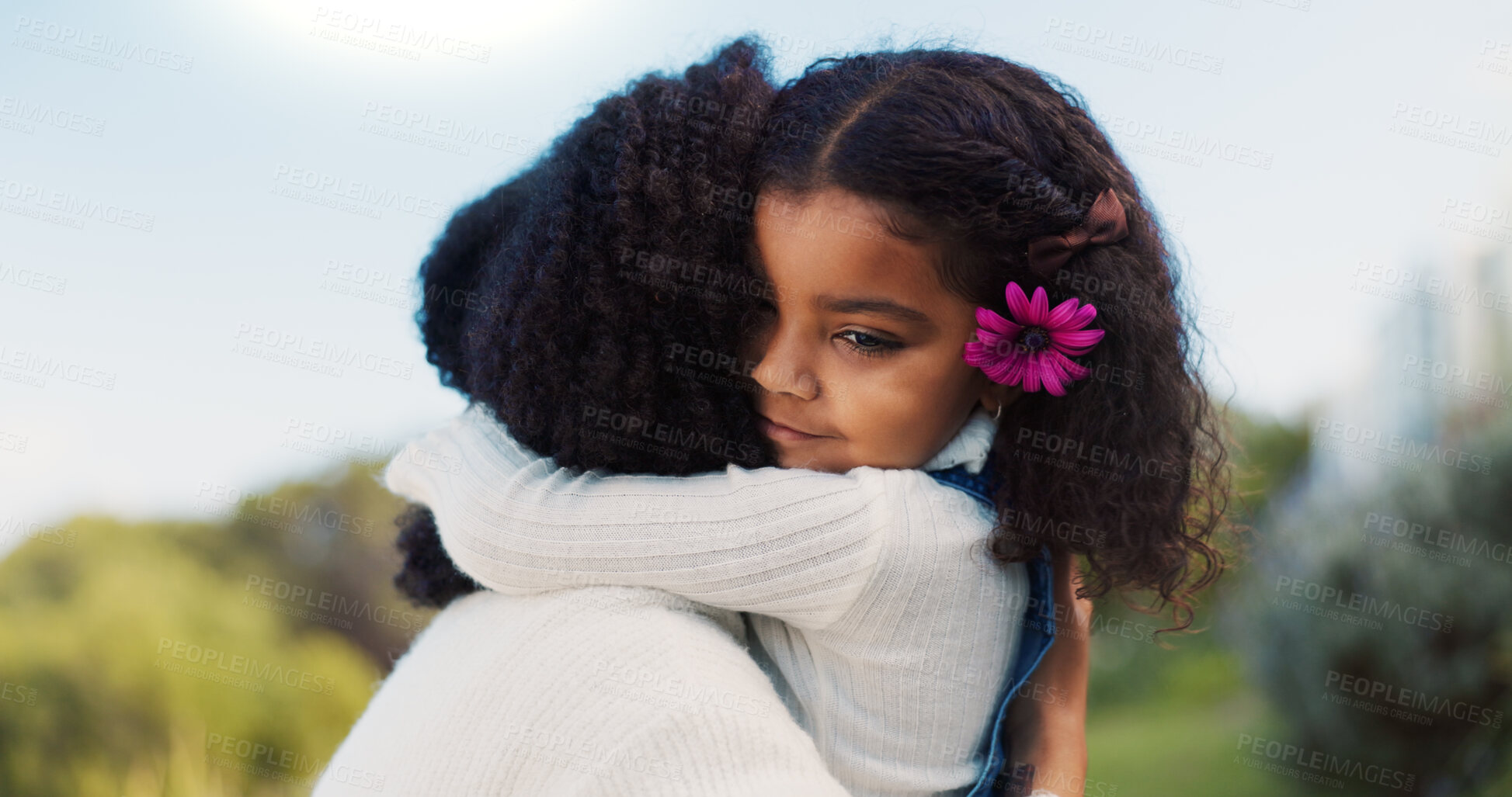 Buy stock photo Love, hug and mother in park, girl and bonding together with happiness, care and nature. Family, parent and mama with daughter, outdoor and embrace with flowers, relationship and comfort with joy