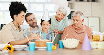 Buy stock photo Birthday, cake and child with parents and grandparents for lunch party, celebration and event together. Big family, happy and boy, mom and dad with dessert, candles and food for surprise in house