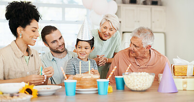 Buy stock photo Birthday, home and parents with child and cake for lunch party, celebration and event together. Family, grandparents and happy boy, mom and dad with dessert, candles and food for surprise in house