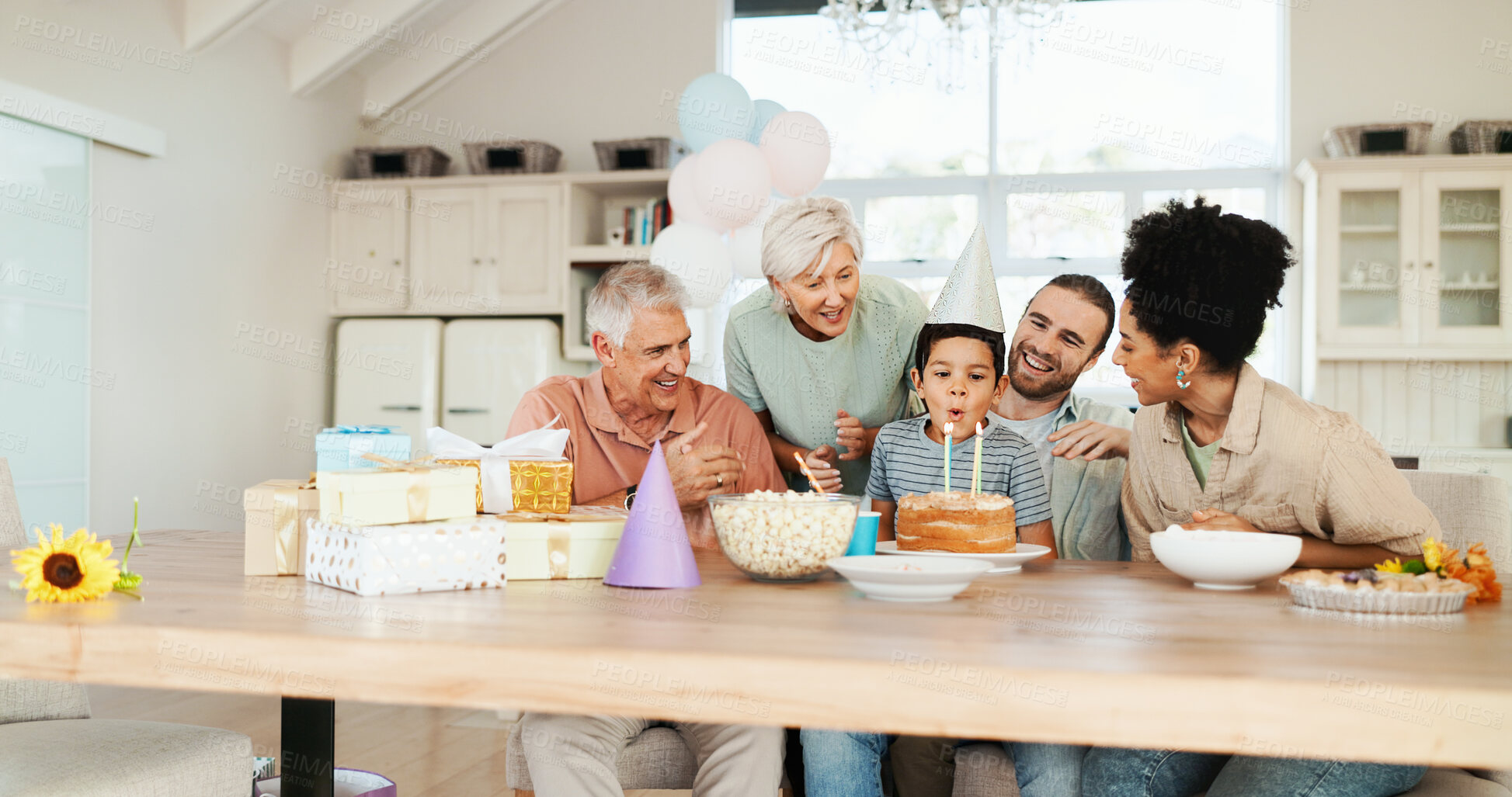 Buy stock photo Birthday cake, family and child blow candles with grandparents, mother and father. Kid, dessert and celebrate party with generations and happy interracial parents clapping for special event in home