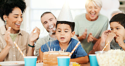 Buy stock photo Birthday, candles and child with parents and grandparents for lunch party, celebration and event together. Family, home and happy kids, mom and dad applause with dessert, snack and food for surprise