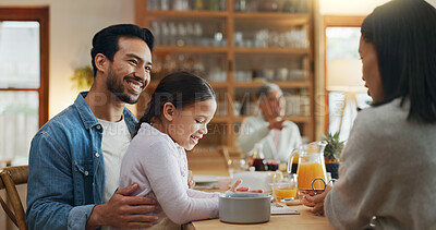 Buy stock photo Family, parents and talking with child at lunch for bonding together, relationship and healthy meal. Love, home and happy people in dining room for social gathering, nutrition and relax with support