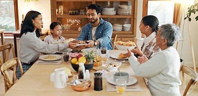 Buy stock photo Helping, child or family in home for lunch for healthy meal, bowl or serving with love or care. Group reunion, parents or people in house for dinner, nutrition or feast with diet, girl or support