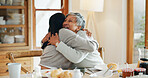 Breakfast, morning and hug with family at home for bonding, nutrition and food. Excited, wellness and health with women embrace in dining room of house for connection, support and brunch together