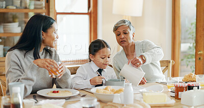 Buy stock photo Breakfast, helping and smile with family at home for bonding, nutrition and food. Morning, wellness and health with child and women eating in dining room of house for connection, support and brunch