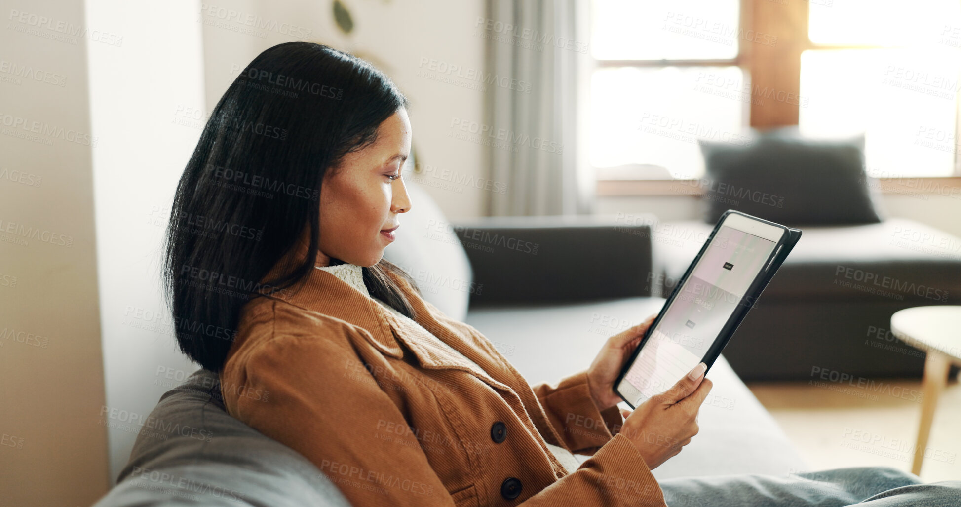 Buy stock photo Home, relax and woman on sofa, tablet and internet with connection, user experience and network. Apartment, person and girl on couch, tech and social media with email notification and communication