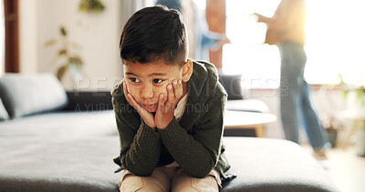 Buy stock photo Anxiety, boy and couple fighting in living room of home for anger, argument or toxic relationship. Conflict, fear and family with child on sofa in apartment with parents shouting for frustration