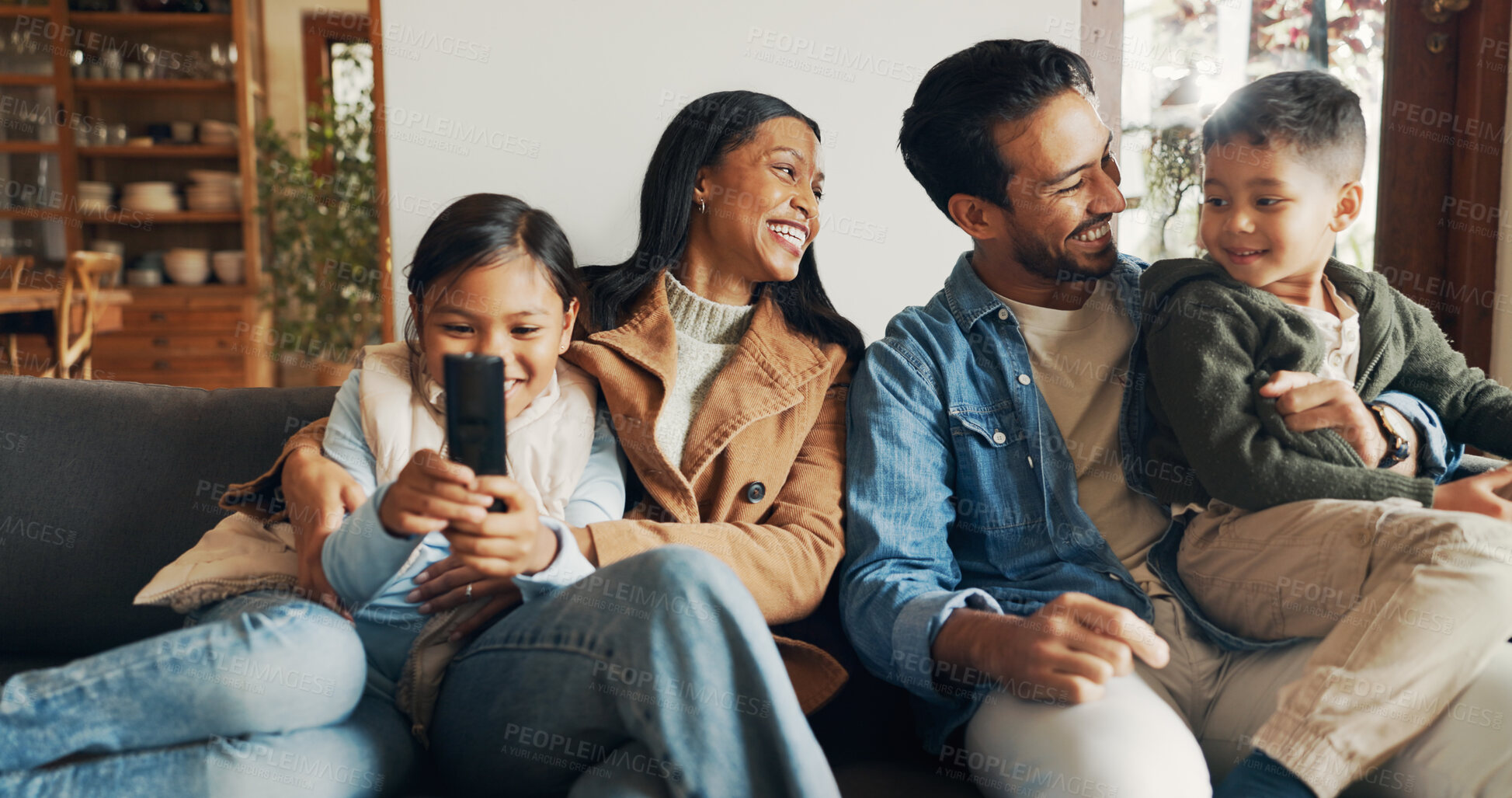 Buy stock photo Relax, watching tv and smile with family on sofa for bonding, show and streaming. Movie, happiness and connection with parents and children in living room of home for care, love or film together