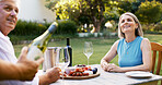 Love, brunch and wine with old couple in nature for romance, anniversary date and bonding. Happiness, retirement and support with senior man and woman at vineyard resort for food, relax and vacation