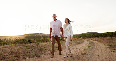 Buy stock photo Farm, walking and holding hands with senior couple, love and relationship with vacation for honeymoon. People, outdoor or dirt road with old man, mature woman and countryside with romance or marriage