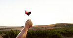 Outdoor, hand and person with red wine, vineyard or quality control with space. Closeup, farmer or business owner with glass, alcohol or expert with inspection, testing or countryside with sky mockup