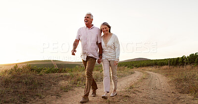 Buy stock photo Countryside, walking and holding hands with senior couple, romance and relationship with vacation for honeymoon. People, space and outdoor with old man, mature woman and farm with marriage and love