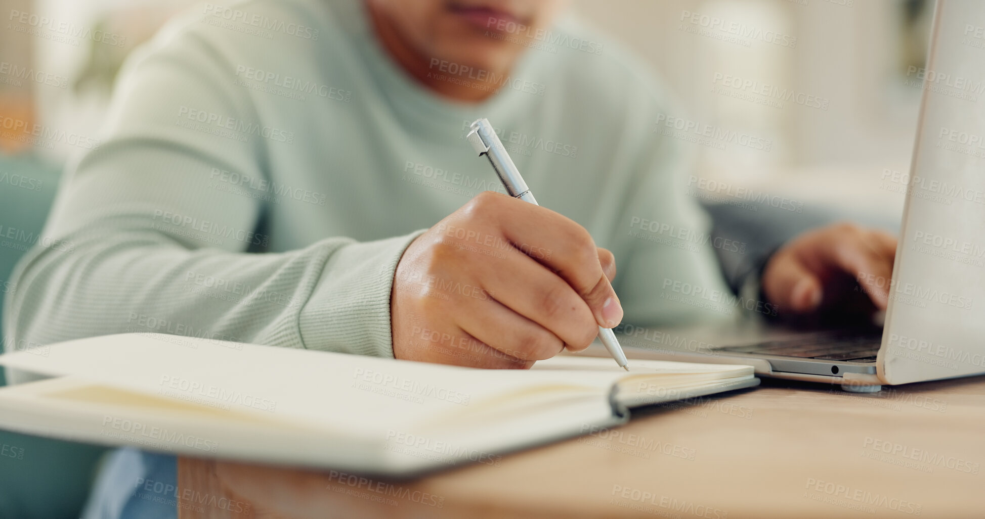 Buy stock photo Hands, laptop and student writing in home for distance education, online report and studying. Assignment, journal planner or person with research for notebook diary, development or school project