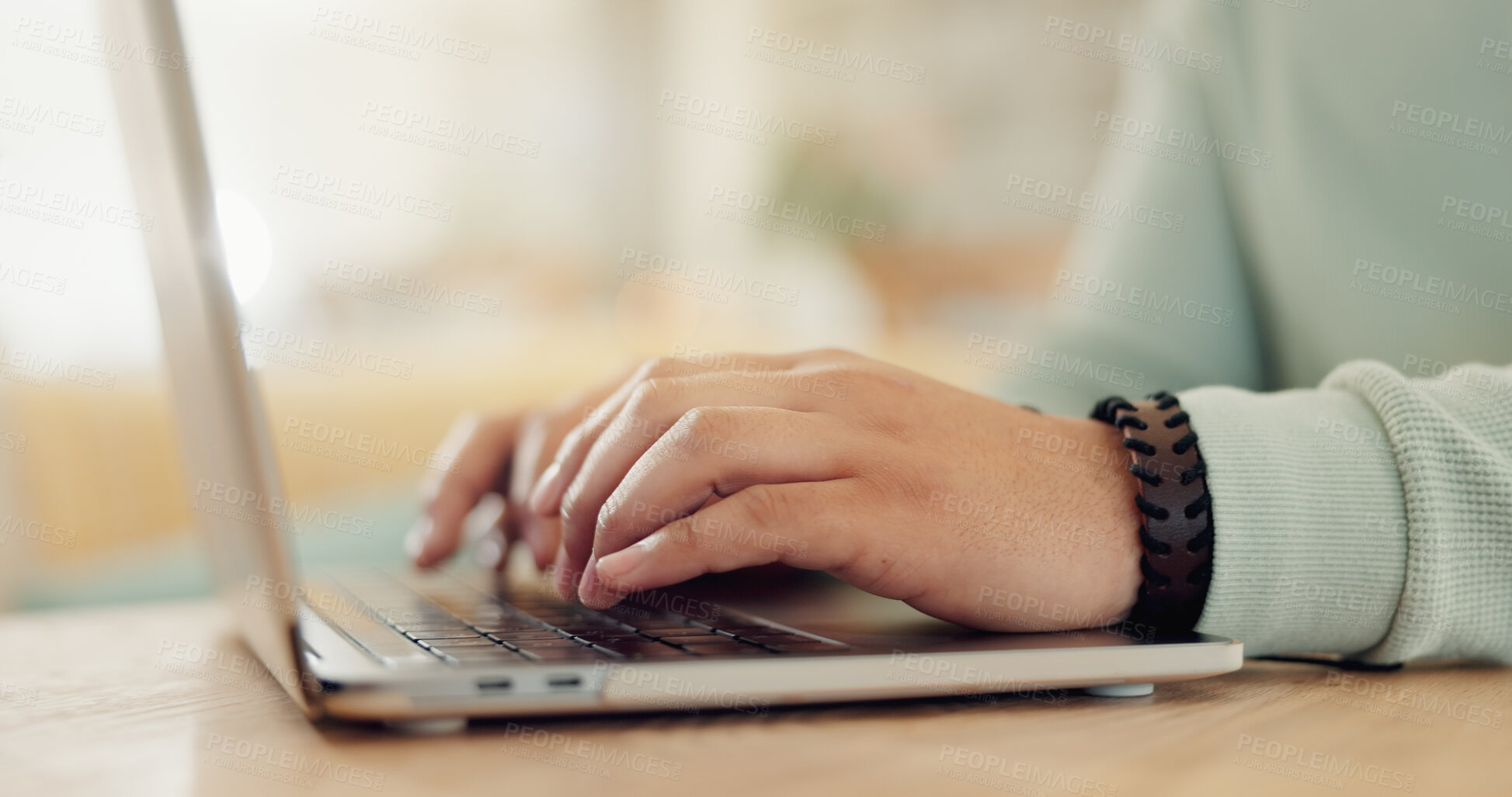 Buy stock photo Hands, laptop and typing with person in home for distance education, online report or study. Assignment, computer and research with student at desk in apartment for development or school project