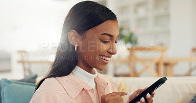 Buy stock photo App, phone and smile with woman on sofa in living room of home for communication or text message. Notification, social media and update with happy Indian person in apartment for mobile connectivity
