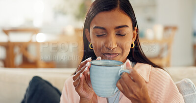 Buy stock photo Break, coffee and scent with woman on sofa in living room of home for relax, rest or wellness. Aroma, cup and drink with person smelling fresh caffeine beverage in apartment for satisfaction or peace
