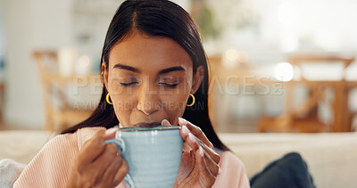 Buy stock photo Aroma, break and coffee with woman on sofa in living room of home for relax, rest or wellness. Cup, drink and scent with person smelling fresh caffeine beverage in apartment for satisfaction or peace