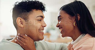 Buy stock photo Couple, relax and smile with love at house for affection, loyalty and partner for support in living room. People, romance and embrace with relationship commitment, bonding together and weekend break