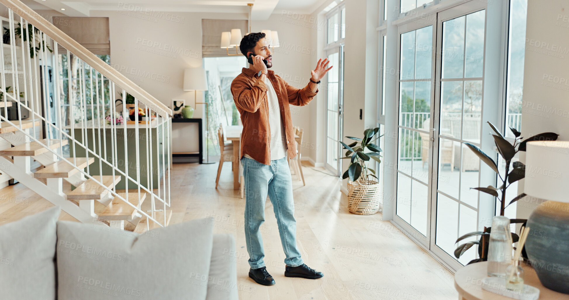 Buy stock photo Phone call, property and realtor with man in home for appointment, open house or viewing. Conversation, sale and showcase with estate agent in apartment for communication, consulting or development
