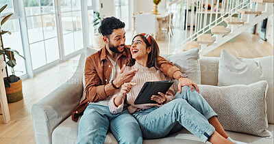 Buy stock photo Home, funny and couple on sofa, tablet and bonding together with happiness in living room. Apartment, man and woman on couch, tech and laughing with digital app for online comedy video, joke and love