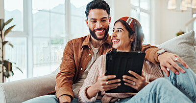 Buy stock photo Bonding, laughing and couple with tablet, entertainment and subscription to app for streaming or online. Happy, woman and man with movies in living room, watching or people with tech for date in home