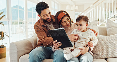 Buy stock photo Parents, baby and tablet on sofa, happy and care with video, cartoon and streaming in living room at house. Man, woman and infant with digital touchscreen, app or subscription on couch at family home