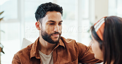 Buy stock photo Love, romance and couple in home, bonding and relax in living room with smile, man and woman on break. Lounge, comfortable and people in relationship on couch, weekend and conversation in house