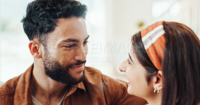 Buy stock photo Happy, relax and talk with couple at house for discussion, bonding together and weekend break on sofa. Smile, people and conversation for romance, partner support and relationship commitment on couch
