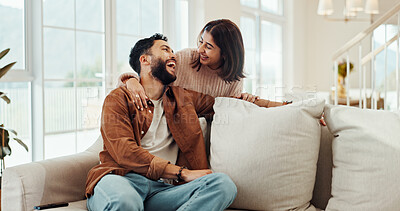 Buy stock photo Smile, couple and laughing on couch at house for funny discussion, bonding together and weekend. Happy, people and embrace with conversation joke, romance and partner care of relationship commitment 