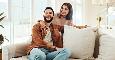 Buy stock photo Love, couple and watching tv in home, bonding and relax in living room with smile, man and woman on break. Embrace, comfortable and people in relationship on couch, entertainment and happy in house