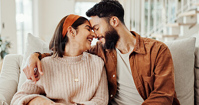 Buy stock photo Couple, relax and laugh with love at house for affection, funny joke and partner support in living room. People, romance and embrace with relationship commitment, bonding together and weekend break