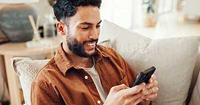 Buy stock photo Internet, smartphone and man relax in home for social media app, message response or reading ebook. Mobile, living room and happy person on website for communication, chat notification or news online