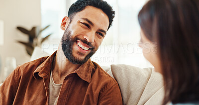 Buy stock photo Couple, relax and laugh with smile on sofa for funny discussion, bonding together and weekend break. Happy, people and conversation of romantic love, partner joke and relationship commitment at house