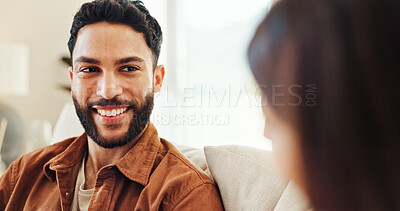 Buy stock photo Smile, man and relax with woman at house for discussion, bonding together and weekend break on sofa. Happy, couple and conversation with romance, partner support and relationship commitment on couch