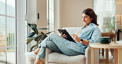 Buy stock photo Smile, tablet and woman on sofa for social media app, news and download game. Digital technology, home and person on website for communication online, chat notification and reading ebook to relax