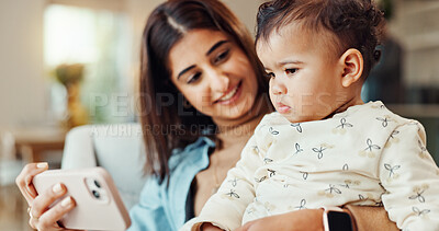 Buy stock photo Mom, baby and phone on sofa, happy and care with video, cartoon and streaming in living room. Woman, mother and daughter with smartphone, learning and subscription on couch in lounge at family house