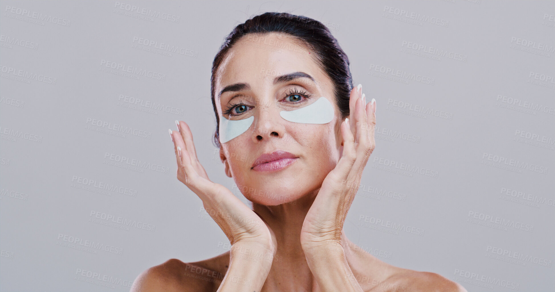 Buy stock photo Cosmetics, woman and eye patches in studio for wrinkle reduction, anti aging treatment and hyaluronic acid. Mockup, mature person and portrait with beauty product for self care on white background