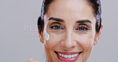 Buy stock photo Skincare, smile or mature woman with face cream for anti aging treatment, wrinkle reduction or portrait. Studio, beauty and facial cosmetics for moisturiser or hydration lotion on white background